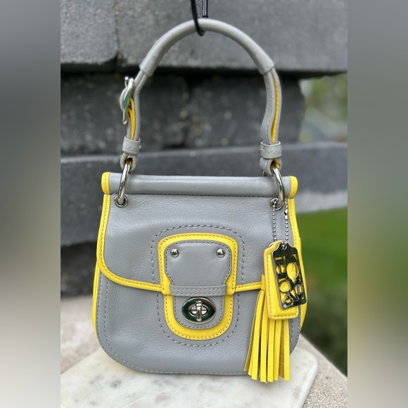 Coach Handbags - EUC Coach Mini Willis Grey and Yellow Color Block style F23709